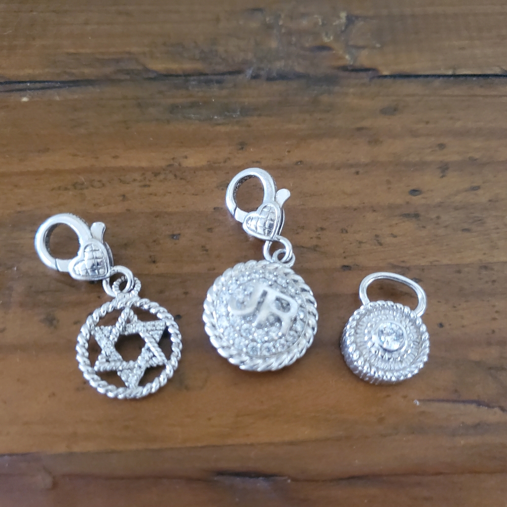 Silver Charm Set with Intricate Designs